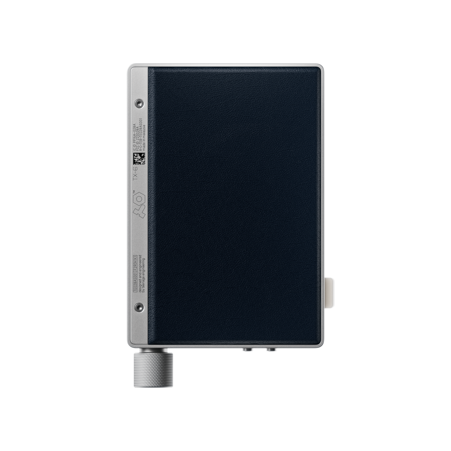 Rear view of the Teenage Engineering TX–6 audio interface showcasing its premium dark blue PU leather backing plate and aluminum casing border