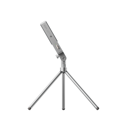 Teenage Engineering CM-15 field microphone on Tripod Mini stand demonstrating adjustable tilt range forward and back side view