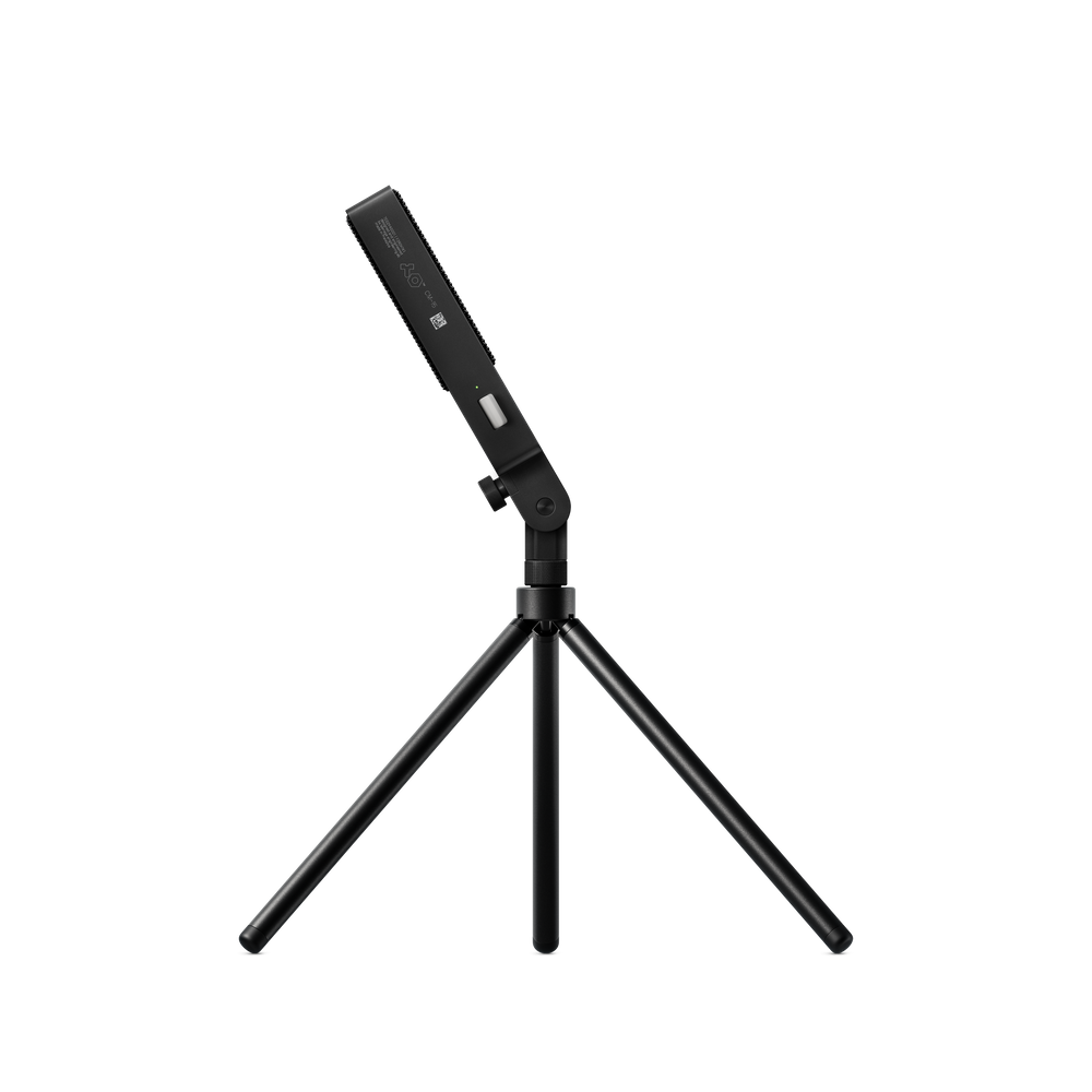 Side view of black Teenage Engineering CM-15 microphone on Tripod Mini stand demonstrating adjustable 90 degree forward and 110 degree backward tilt