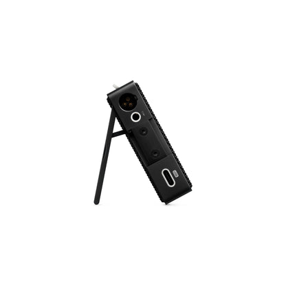 Bottom view of the Teenage Engineering CM-15 Black showing the mini XLR port, 3.5mm line output, USB-C interface, and built-in kickstand deployed