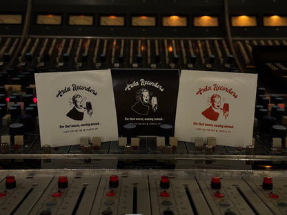 Arda Recorders 3-sticker pack with black, white and red studio logo stickers on analog mixing console