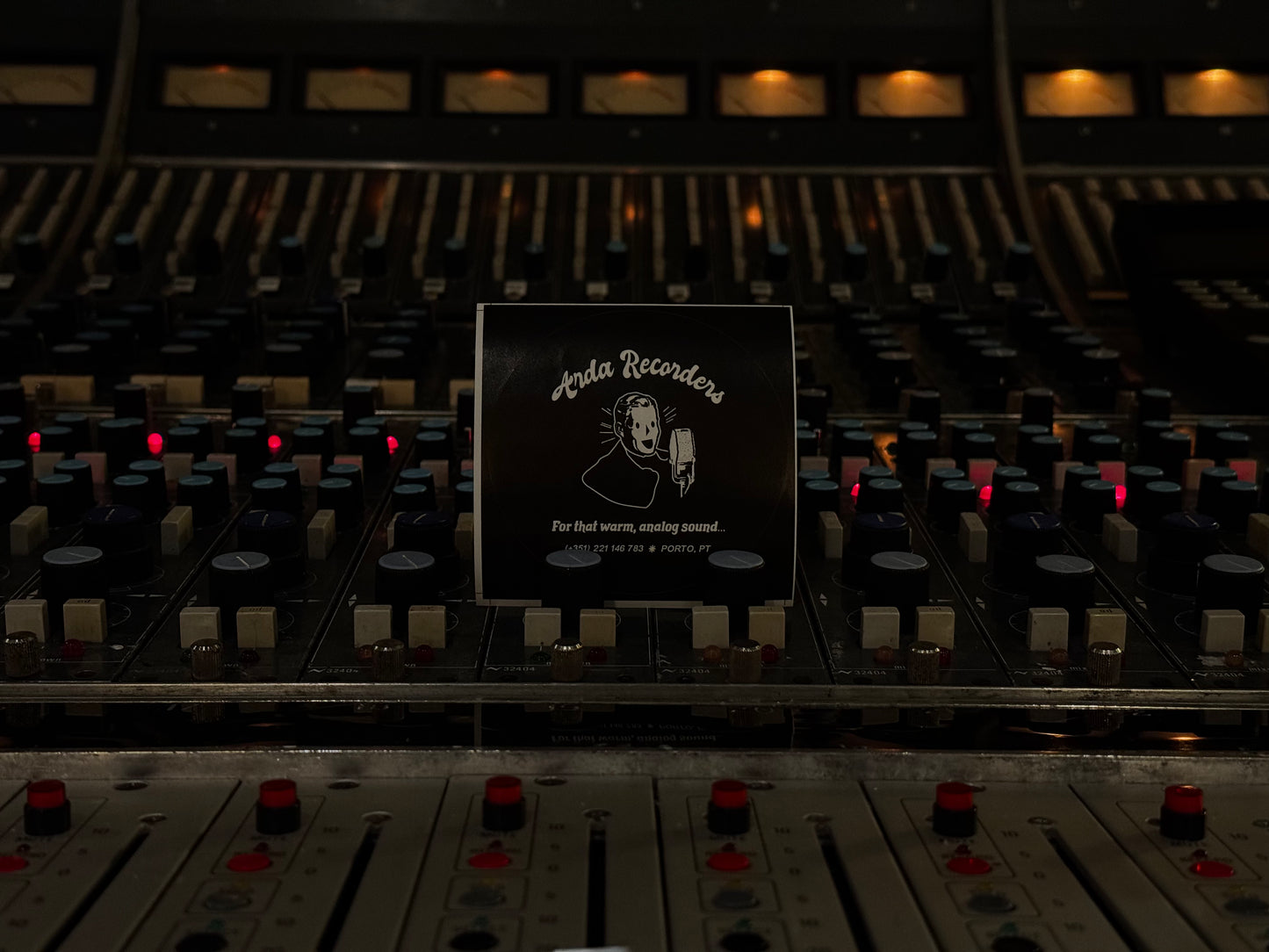 Black Arda Recorders logo sticker displayed on vintage analog recording console