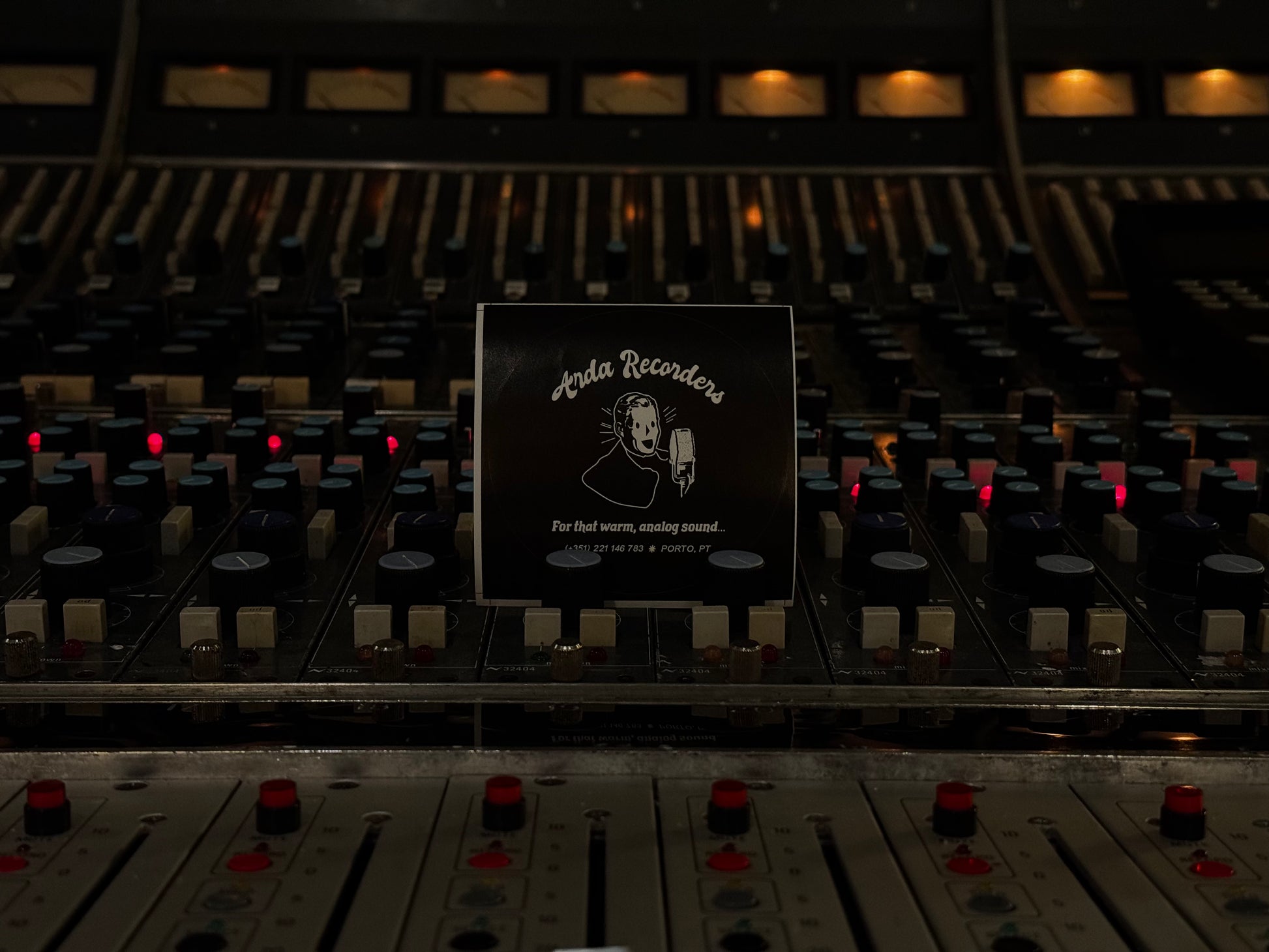 Black Arda Recorders logo sticker displayed on vintage analog recording console
