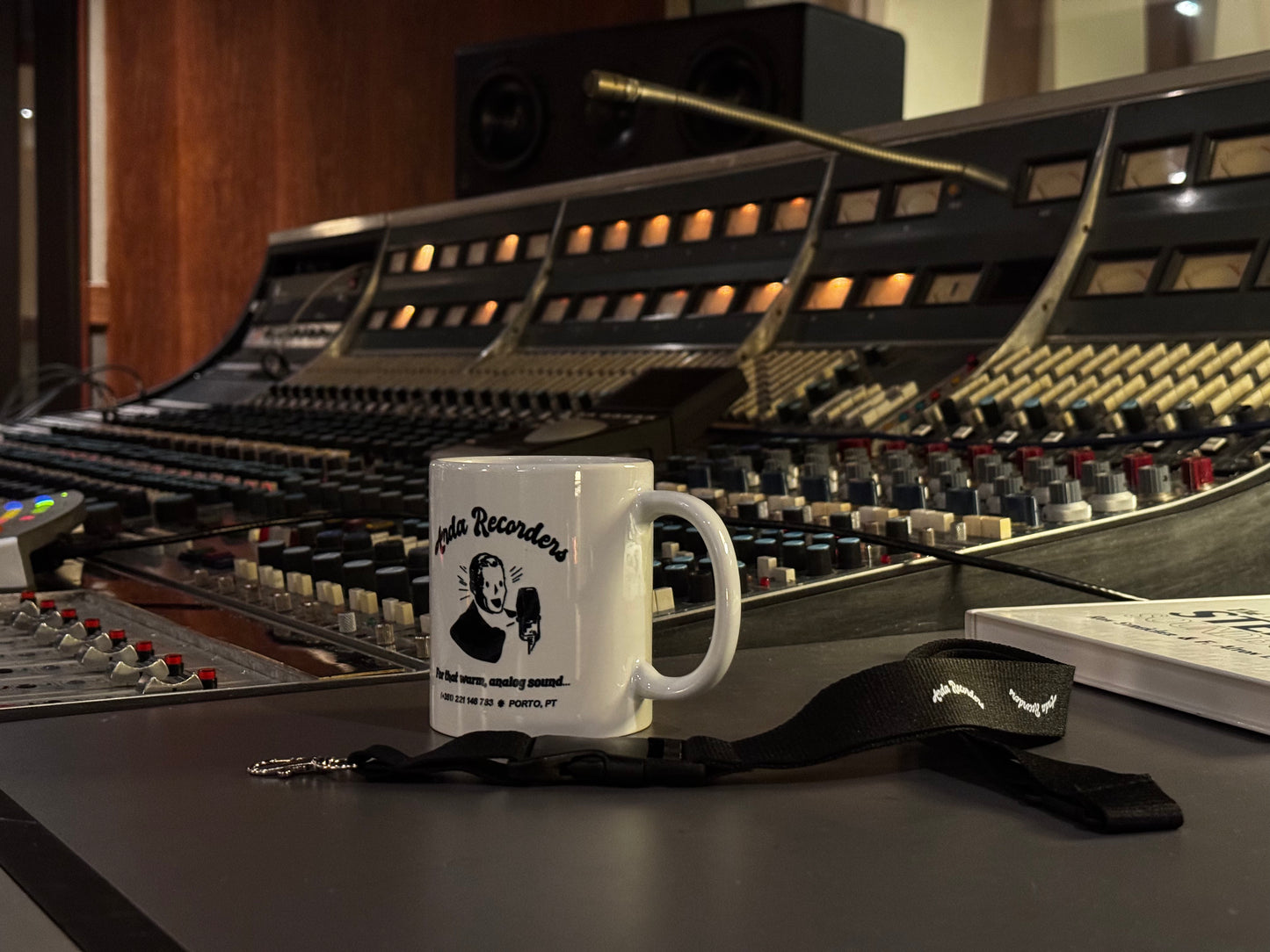 Arda Recorders white ceramic mug displayed in professional analog recording studio