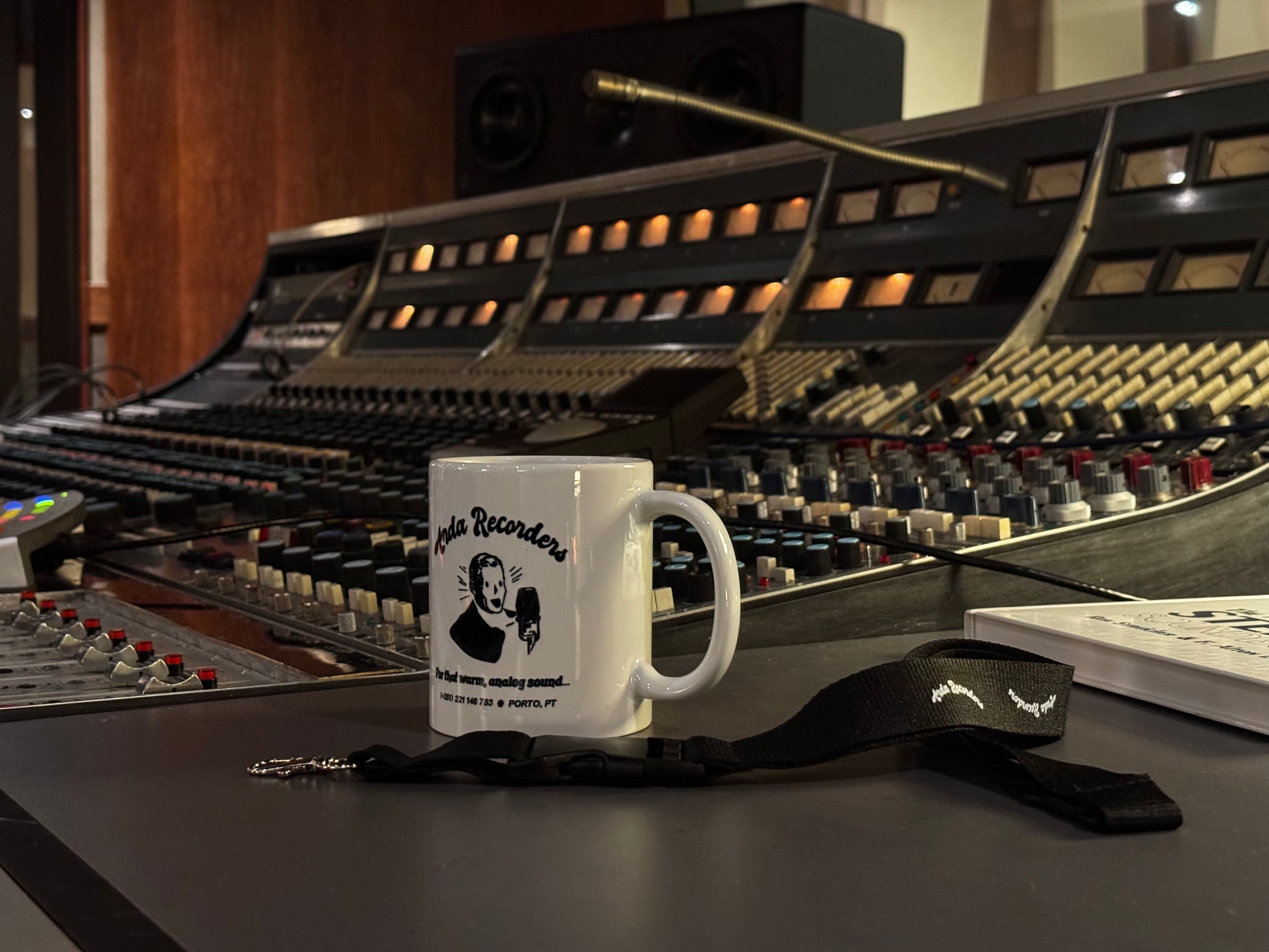 Arda Recorders white ceramic mug displayed in professional analog recording studio
