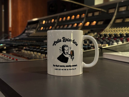 Arda Recorders ceramic coffee mug on analog recording studio mixing console