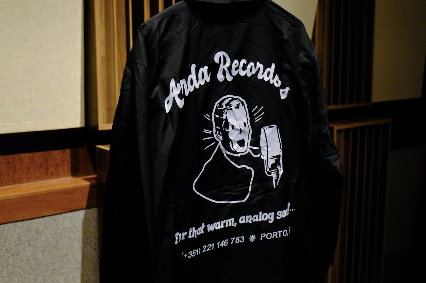Back print detail on Warm Analog coach jacket for music producers and audio engineers close-up