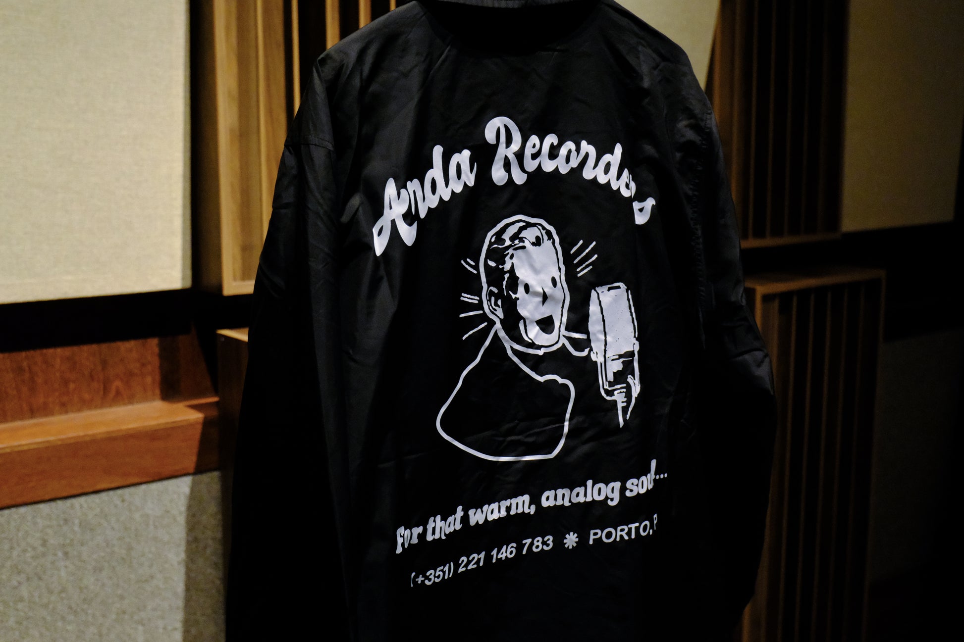 Back print detail on Warm Analog coach jacket for music producers and audio engineers close-up