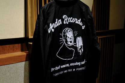 Back print detail on Warm Analog coach jacket for music producers and audio engineers close-up