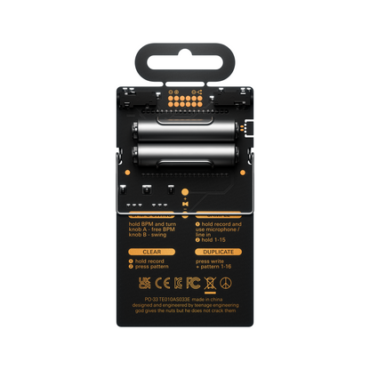 Rear view of the Teenage Engineering PO-33 K.O! showing the battery compartment with two AAA batteries and circuit board details.