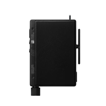 Rear view of Teenage Engineering TP-7 Black field recorder showing premium protective textured black PU leather backing panel