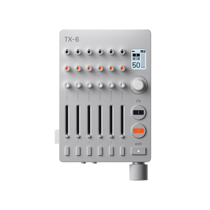 Front view of the silver Teenage Engineering TX–6 portable stereo mixer showing its control knobs, vertical track faders, and digital display screen