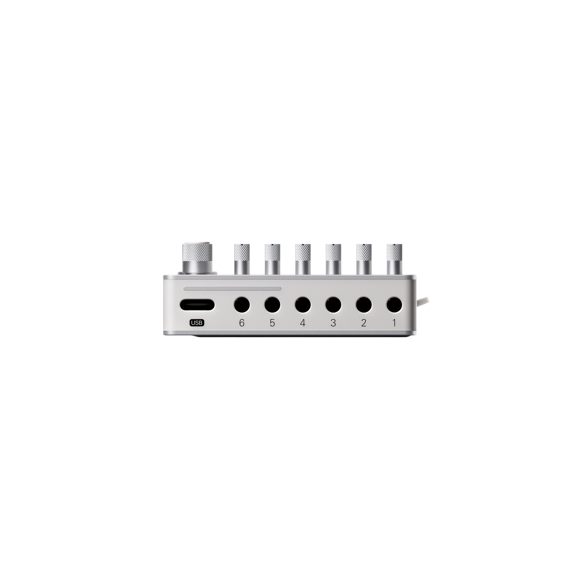 Top edge view of the Teenage Engineering TX–6 hardware showing the USB-C audio interface port alongside 3.5mm mini jack inputs numbered 1 through 6