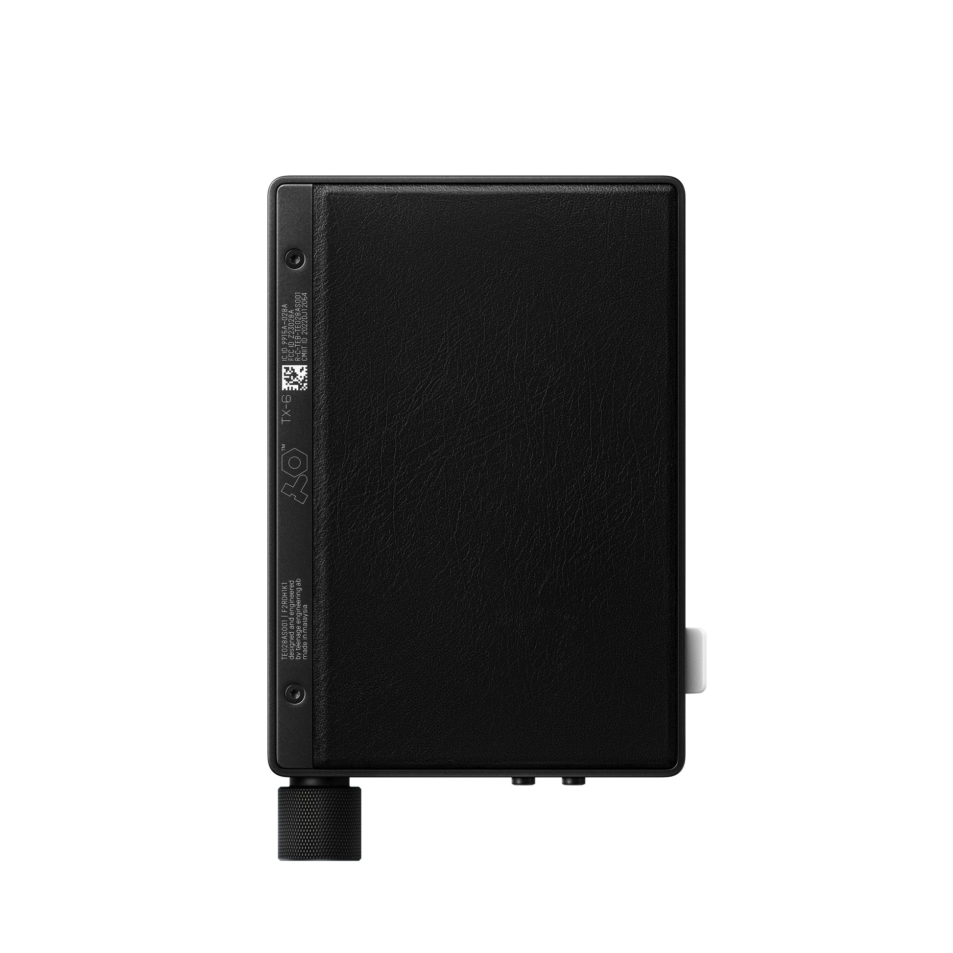 Rear view of Teenage Engineering TX-6 Black ultra portable mixer featuring a premium protective textured black PU leather backing panel